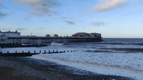 Cromer Pier Norfolk showing waves on the sea taken on a cold winters day Video stock 122249853