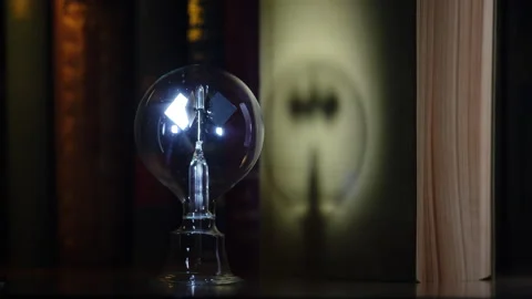 Crookes Radiometer Lght Mill With Soft Shadow Moving on Book Cover Stock Footage 331100761