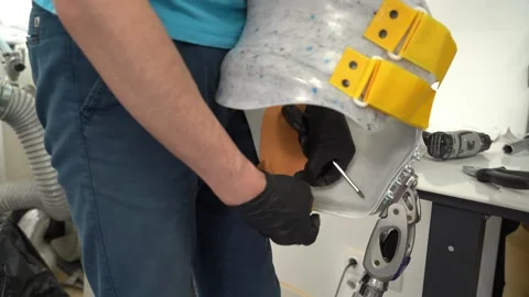 Crop artist assembling prosthetic limb at worksho Stock Footage 236621453