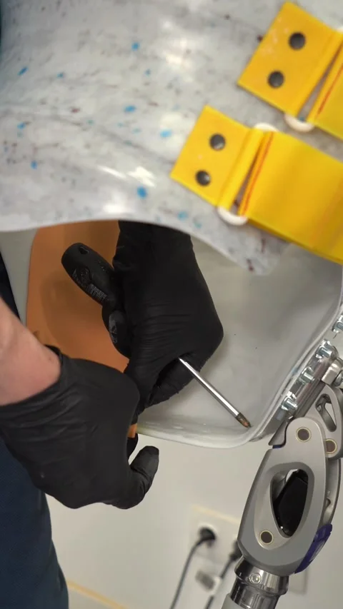 Crop artist assembling prosthetic limb at workshop. Vertical video Stock Footage 237606136