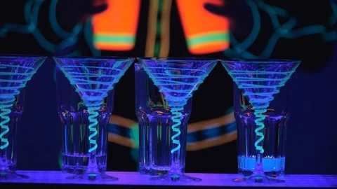 Crop. Barmen show. Performance. Barman is mixing and pouring alcohol into glass Stock Footage 122249085