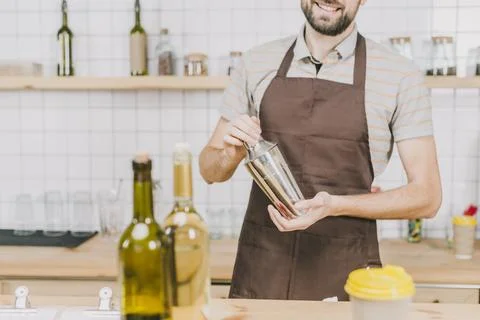 Crop bartender making cocktail Stock Photos