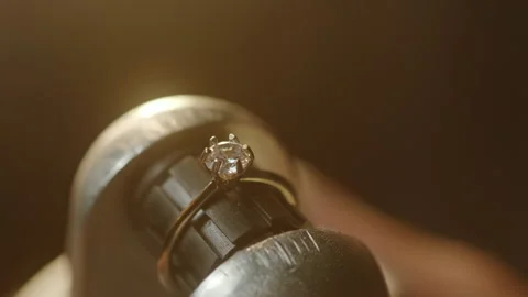 Crop blacksmith making diamond ring in workshop Stock Footage 260261588