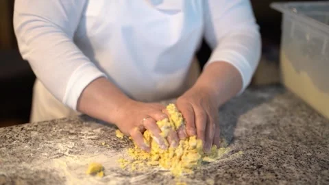 Crop chef kneading dough on table Stock Footage 240414992