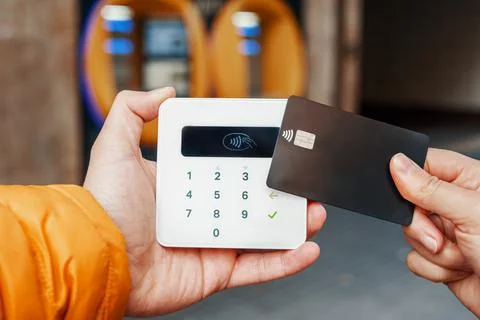 Crop client paying to vendor Stock Photos