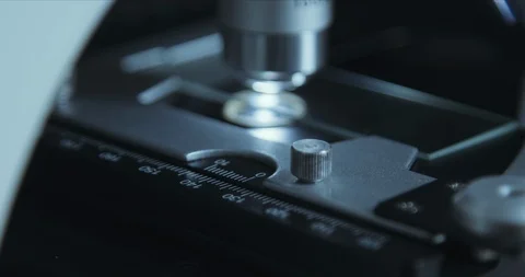 Crop closeup shot of microscope in the laboratory, scientist is conducting study 스톡 동영상 125770682