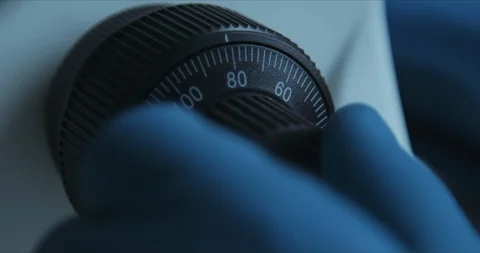 Crop closeup shot of microscope in the laboratory, scientist is conducting study Vídeo Stock 125771642