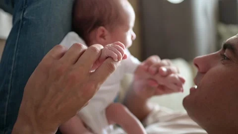 Crop dad talking to infant Stock Footage 269352121