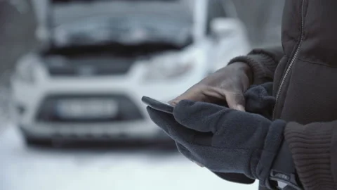 Crop driver calling service having car trouble Stock Footage 100554620
