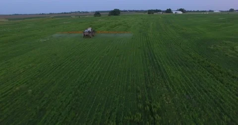 Crop Duster tending to crops Video stock 64225324