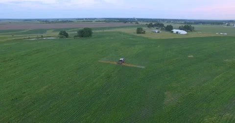 Crop Duster tending to crops Video stock 64225472