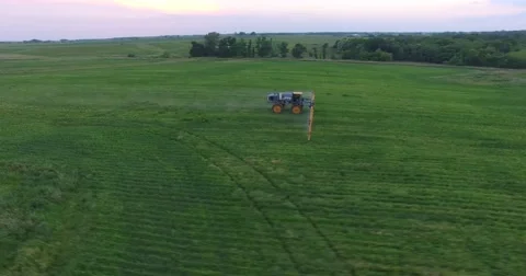 Crop Duster tending to crops Video stock 64225547