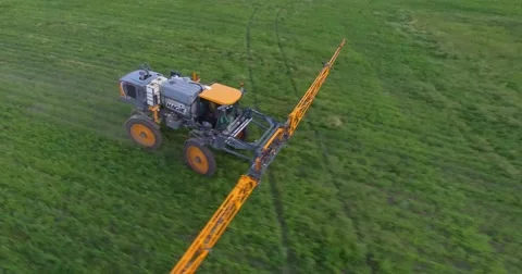 Crop Duster tending to crops Video stock 64225560