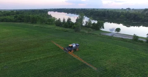 Crop Duster tending to crops Video stock 64225595