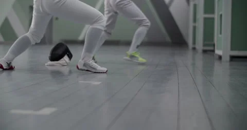 Crop fencers practicing in gym Stock Footage 224965043