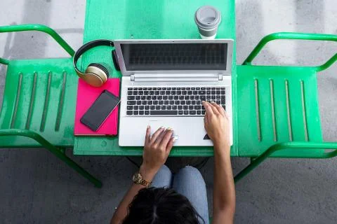 Crop freelancer browsing data on laptop Stock-Fotos