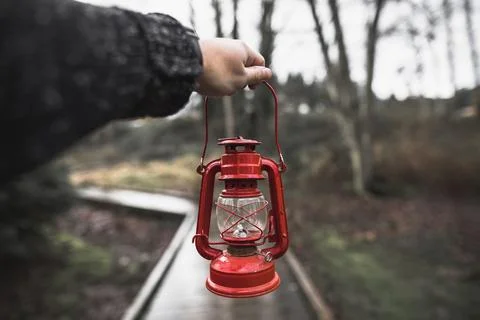Crop hand with lantern Stock Photos