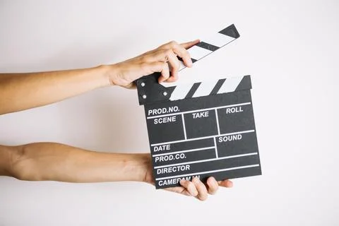 Crop hands with clapperboard 2 Resolution and high quality beautiful photo Stock Photos