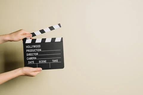 Crop hands with clapperboard. High quality photo Stock Photos