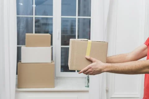 Crop hands with parcels. High quality photo Stock Photos