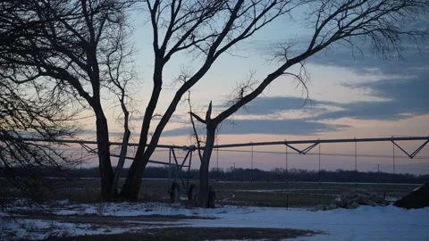 Crop irrigation system in foreground of sunrise Stock Footage 270502952