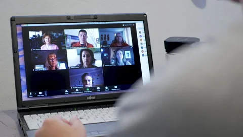 Crop man having video call via netbook Stock Footage 132017890