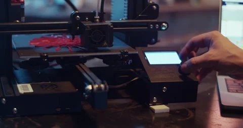 Crop man operating on modern 3D printer Stock Footage 259391774