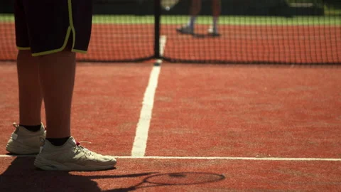 Crop man preparing for tennis match with opponent Stock Footage 138428613
