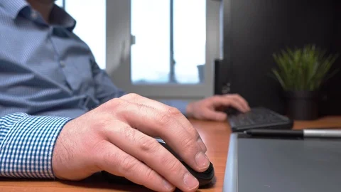 Crop man using computer in office Stock Footage 103497436