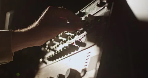 Crop man using illuminated amplifier Stock Footage 201852940