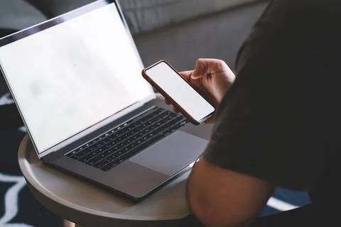 Crop man using smartphone during break at home Stock Photos