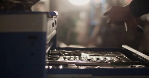 Crop mechanic taking tools from drawer Video stock 221108071