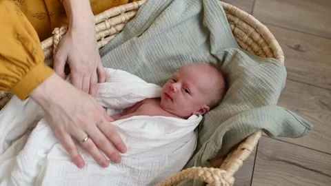 New born baby boy swaddled immediately a, Stock Video