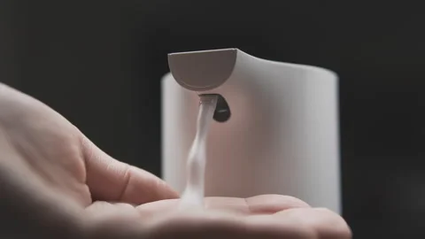Crop person using automatic soap dispenser Stock Footage 153106429