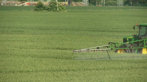 Crop Spraying Tractor on field Stock Footage 29209164