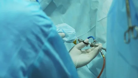 Crop surgeon doing laparoscopic operation Stock Footage 95793815