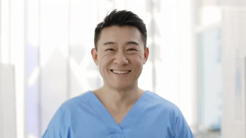 Crop view of cheerful man taking off medical protective mask and looking to Stock Footage 150430337