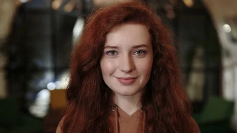Crop view of cheerful red haired woman smiling and looking to camera. Portrait Stock Footage 152162635