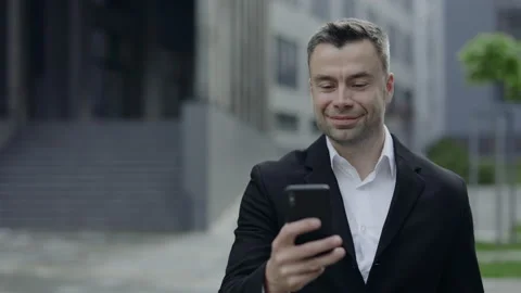 Crop view of handsome mature guy in classical suit and shirt shaking head and Stock-Footage 145463717