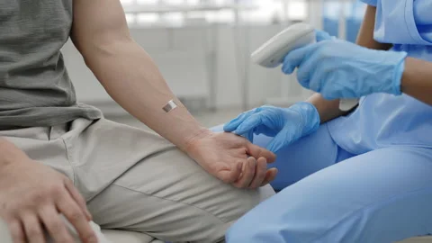 Crop view of medical worker on protective medical gloves scanning bar code on Video stock 150681332