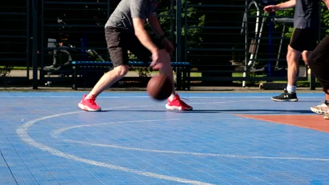 Crop view men legs running by basketball court Video stock 204710071