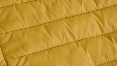 Crop view of yellow quilt Stock Footage 126410818