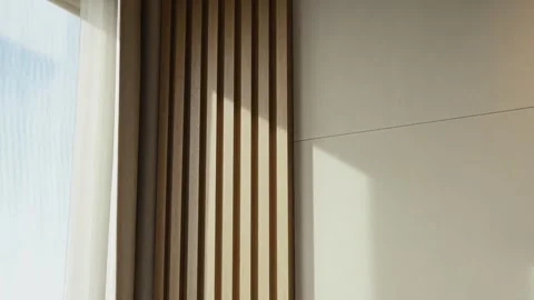 Crop of wall colored in light tone with decoration of vertical wooden planks and Stock Footage 263674565