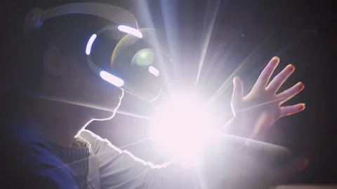 Crop woman's in VR headset moving hands in abstract dark space Stock Footage 103632831