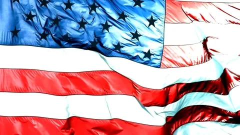 Cropped and backlit US flag blowing in the wind. Stock Footage 342477043