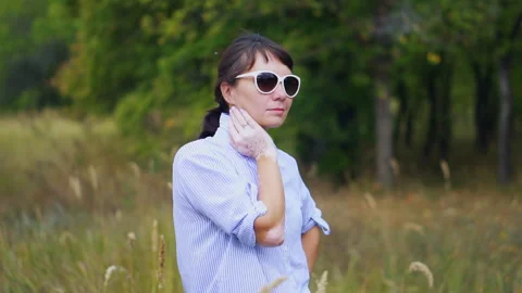 Cropped back view of beautiful young European woman with skin condition that Stock Footage 138830931