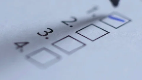 Cropped of businessman writing on checklist Stock Footage 80020587