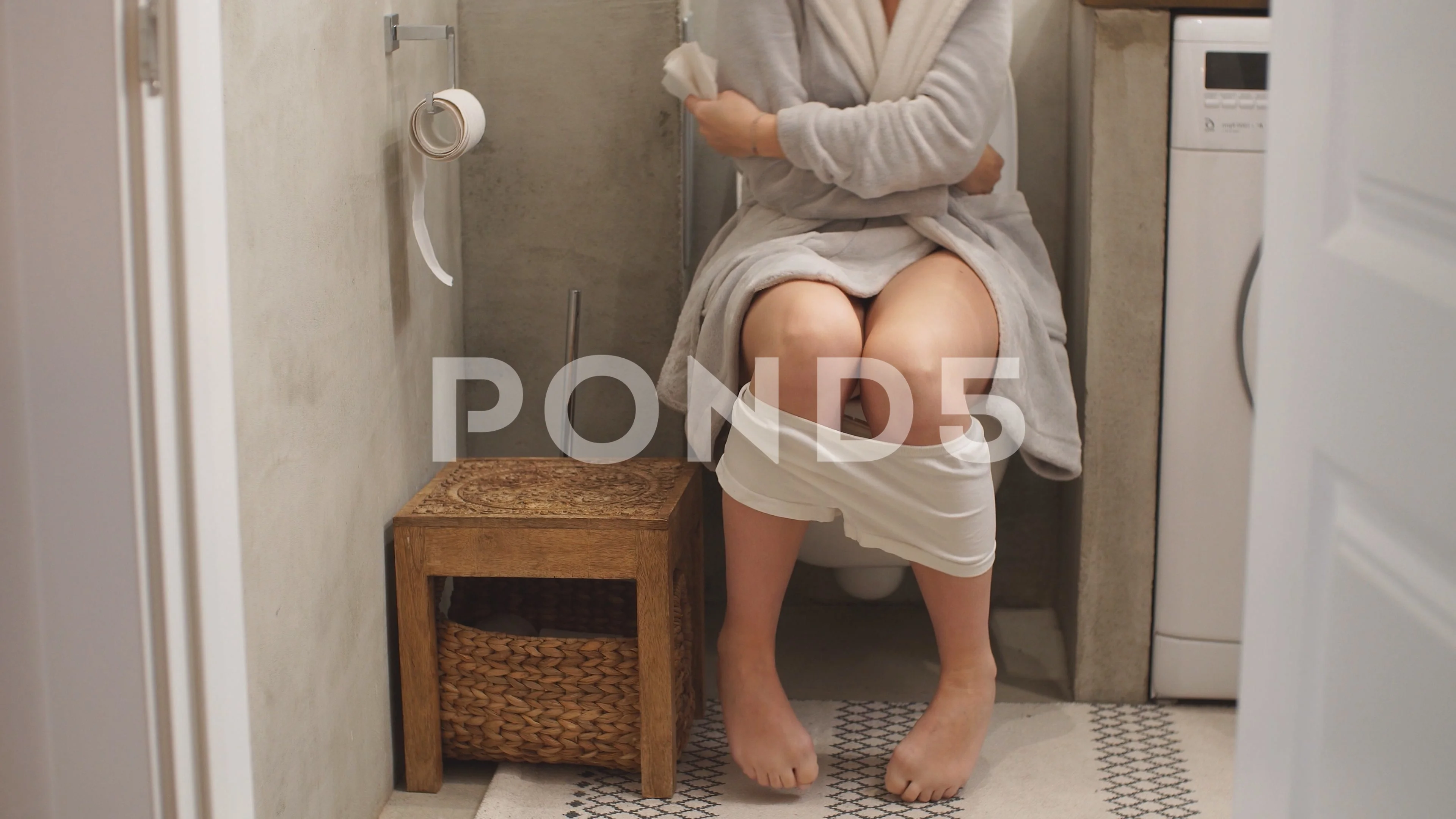 Girl on the Toilet. a Young Woman with Bare Feet Enters the Bathroom and  Sits on the Toilet, Taking Off Her Underwear. Stock Footage - Video of  white, person: 263563050