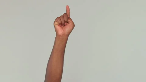 Cropped close up of african man guy male hand arm pointing on workspace isolated Stock Footage 148321799
