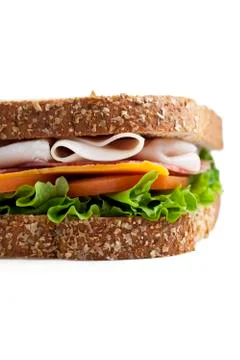 Cropped close up image of ham sandwich Stock Photos